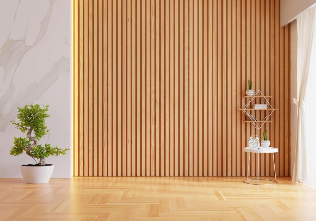 Minimalistic room with a wooden slat wall, a potted plant, and a small decorative shelf.