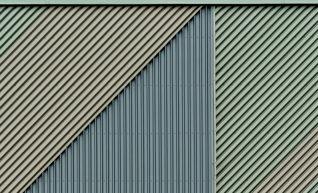 Close-up of a diagonal patterned metal wall with a unique texture design.